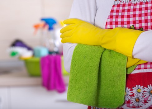 Wet floor warning and tidy workspace to reduce slip hazards
