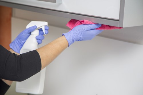 Chiswick cleaners focusing on detailed surface cleaning in a modern interior